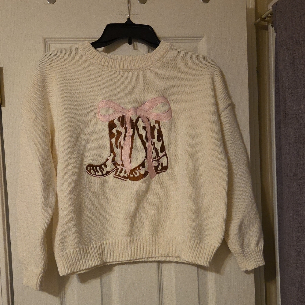Chic Cream Sweater with Pink Bow and Boots Design